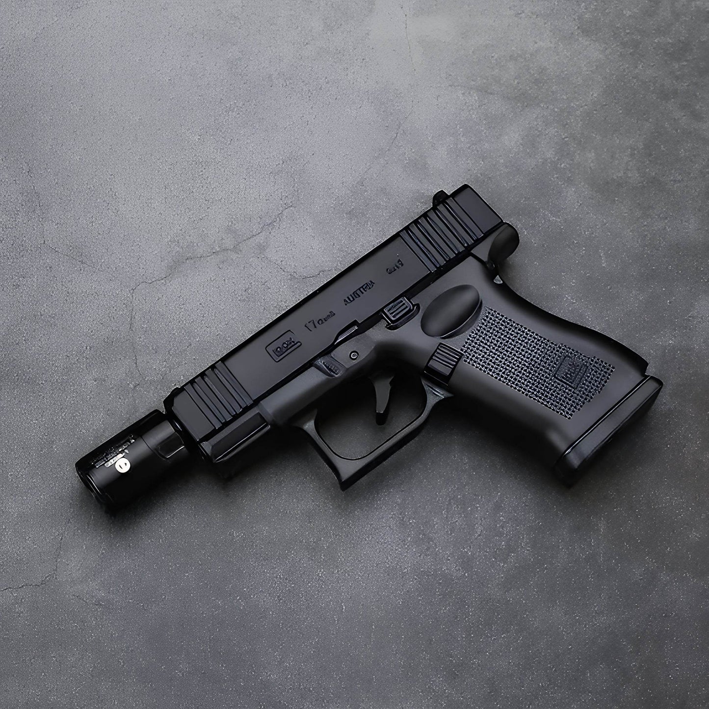 Glock 17 Pistol Lighter with laser sight and silencer side profile