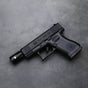 Glock 17 Pistol Lighter with laser sight and silencer side profile