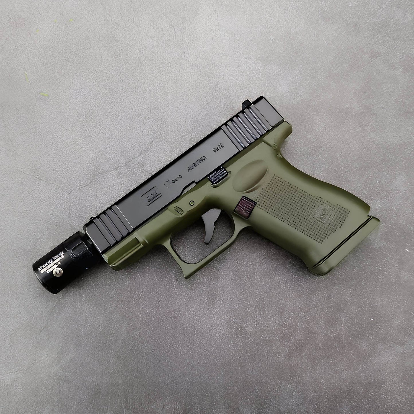 Glock 17 Pistol Lighter with laser sight and silencer side profile